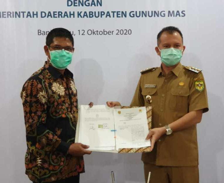 PenandatanganMoU Bupati Gumas Dengan PT. PLN Unit Induk wilayah Kalsel dan Kalteng